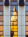 Reflection of Fisherman`s Bastion, aka Halaszbastya, fairy tale towers in modern hotel windows. Architectural contrast