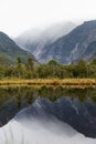 Reflection of Franz Josef Mountains in Peters Pool