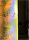 The reflection of the glass stained windows on the column in Lyon Cathedral, France Royalty Free Stock Photo