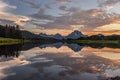 Reflection of Grand Tetons in Jackson Lake at sunset Royalty Free Stock Photo