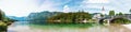 Reflection of the Holy spirit Church, lake Bohinj Slovenia. Panorama Royalty Free Stock Photo