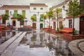 Reflection of houses in the town hall square of Salobrena village, Granada province, Andalusia, Spain Royalty Free Stock Photo