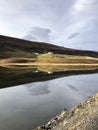 reflection in Iceland lake and cabin Royalty Free Stock Photo