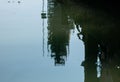 Reflection of industrial construction structure on calm water surface Royalty Free Stock Photo