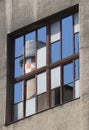 Reflection of Industrial Tower in Window Panes Royalty Free Stock Photo