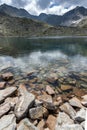 Reflection of Irechek peak in Musalenski lakes, Rila mountain