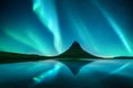 Reflection of Kirkjufell mountain and Northern lights Royalty Free Stock Photo