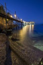 Reflection of lights under trabucco. Royalty Free Stock Photo