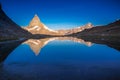 Reflection of the Matterhorn on blue lake at sunrise, Swiss Alps, Zermatt Royalty Free Stock Photo