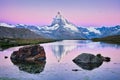 Reflection of Matterhorn mountain in Stellisee lake at sunrise