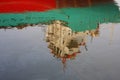 Reflection of merchantman and oil slick, Thailand.