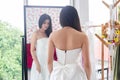 Reflection in mirror of asian bride on wedding. Royalty Free Stock Photo