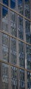 Reflection of a modern office building into the glass of another modern office building Royalty Free Stock Photo