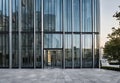 reflection of modern skyscrapers in windows of office building, during daylight Royalty Free Stock Photo