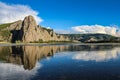 A reflection of a Mongolian Mountain in the evening sun on a river Royalty Free Stock Photo