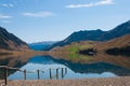 Reflection of the montains in the Lake Taylor, Canterbury, New Zealand