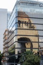 Reflection of the Monument to the Revolution on a tall building Royalty Free Stock Photo