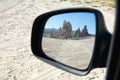 Reflection of the mountain with an ancient dwelling in the car m Royalty Free Stock Photo