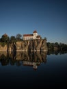 Reflection of mountain chapel church Bergkirche Beucha at heart shaped lake Kirchbruch See in Brandis Leipzig Saxony