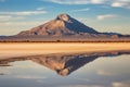 reflection of a mountain in a desert mirage