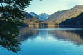 Reflection of a mountain on the surface of a lake in the Alps in the morning in autumn Royalty Free Stock Photo