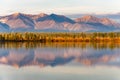 Autumn landscape with mountain range and Koluuma lake in Yakutia, Sakha Republic, Russia