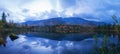 Reflection of mountains and clouds in the calm surface of the lake. Peaceful landscape. Khibiny Royalty Free Stock Photo