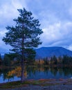 Reflection of mountains and clouds in the calm surface of the lake. Peaceful landscape. Khibiny Royalty Free Stock Photo