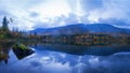 Reflection of mountains and clouds in the calm surface of the lake. Peaceful landscape. Khibiny Royalty Free Stock Photo