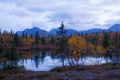 Reflection of mountains and clouds in the calm surface of the lake. Peaceful landscape. Khibiny Royalty Free Stock Photo