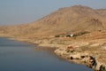 The reflection of the mountains in the Tigris River in the city of Hasankeyf, Turkey Royalty Free Stock Photo