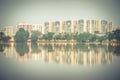 Reflection of new estate HDB housing complex on Jurong Lake, Sin