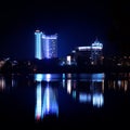 Reflection of a night city in water. Minsk.