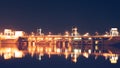 Reflection of night hydroelectric power station in river. Vyshgorod, Ukraine.