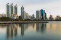 Reflection office building over water lake i Royalty Free Stock Photo