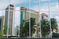 Reflection of the office buildings in the modern building windows in Kuala Lumpur, Malaysia. Royalty Free Stock Photo