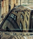 Reflection of old building as in modern car Royalty Free Stock Photo