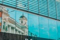 reflection of old building in glass window Royalty Free Stock Photo