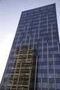 Old building reflection in new one Royalty Free Stock Photo