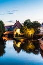 Reflection of old mill in water at sunset sunrise Royalty Free Stock Photo