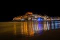 Reflection of the old town of Peniscola at night, Peniscola, Castellon, Spain