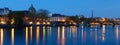 Reflection of Paris city in Seine river with Pont des Arts bridge foreground during twilight, Paris, France Royalty Free Stock Photo