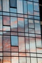 Reflection of pastel Sun set on window glass of modern corporate office building Royalty Free Stock Photo