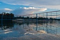 Reflection of picturesque and coloful clouds in a water of Ada lake, Belgrade Royalty Free Stock Photo