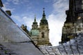 Reflection in a puddle of the Church of Saint Nicholas in Prague, Czechia