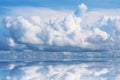 Reflection pure clear blue sky huge white gray cloud on water of lake