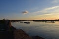 Landscape of the Danube River. Bright yellow sky over the Danube after sunset Royalty Free Stock Photo