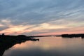 Reflection of purple-blue sky in water. The wide river Danube landscape Royalty Free Stock Photo