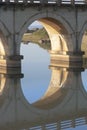 Reflection of a railway bridge crossing a lagoon on the KZN South Coast of South Africa.