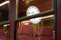Reflection of a railway clock Royalty Free Stock Photo